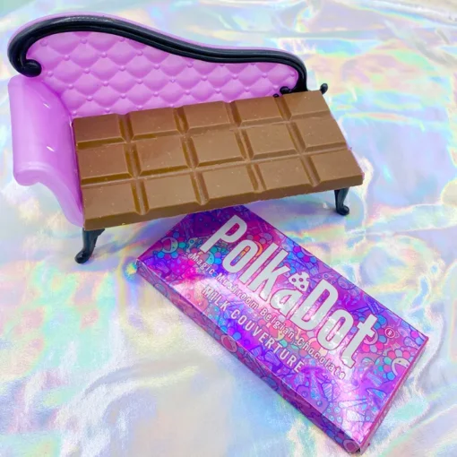 A chocolate bar on a couch